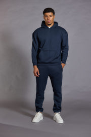 Mens navy joggers relaxed fit ribbed waistband front